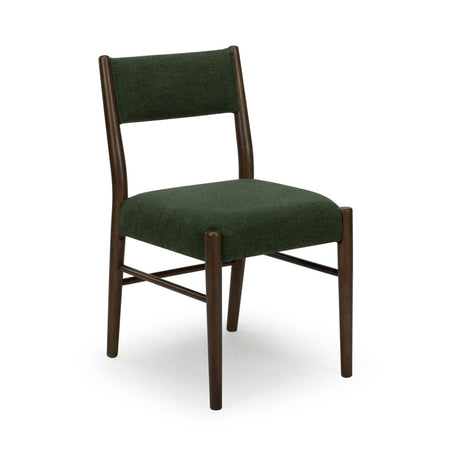 Mid-century modern armless dining chair with dark wood frame and green boucle upholstered seat and back