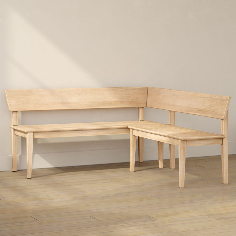 Light natural wood L-shaped corner dining bench with backrest on light hardwood floor in minimalist kitchen nook