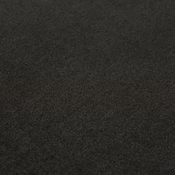 Dark charcoal carpet texture close-up, low-pile plush flooring background for interior design and home decor
