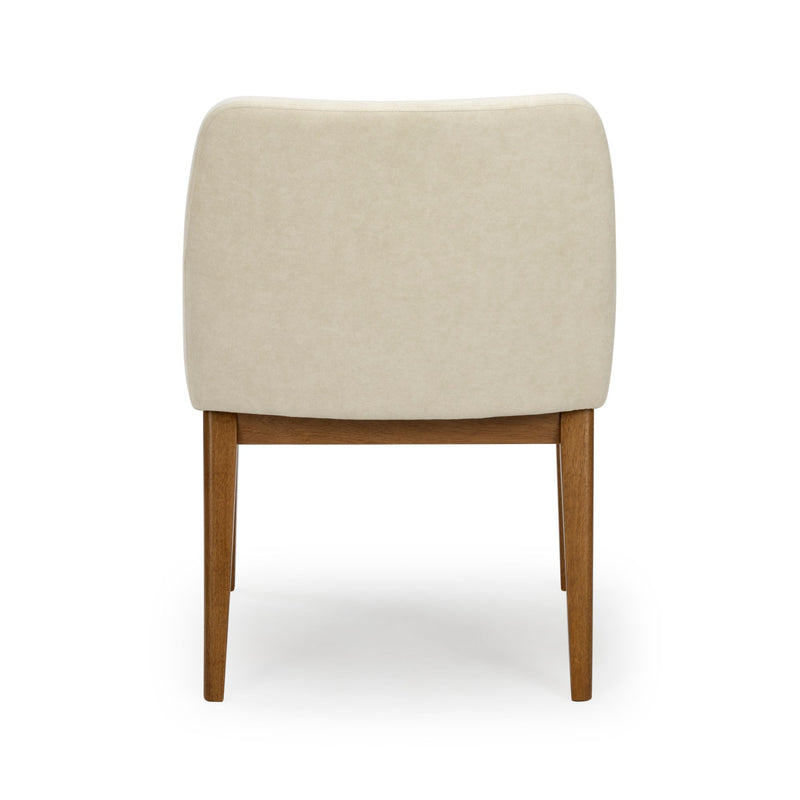 Beige upholstered dining chair with mid-century modern walnut wood legs, back view on white background