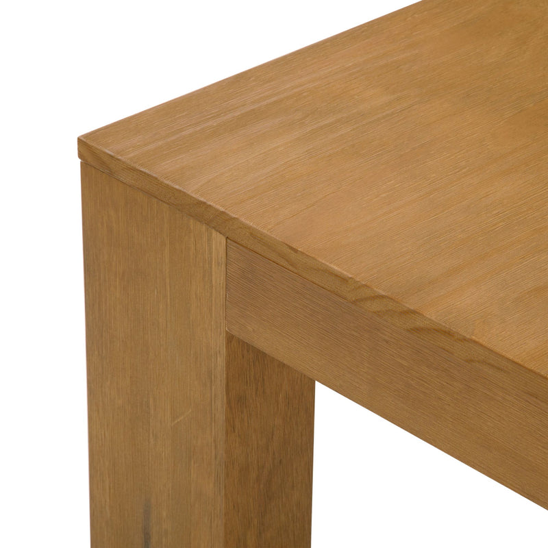 Wooden table corner with a smooth finish, showcasing minimalist design and craftsmanship.
