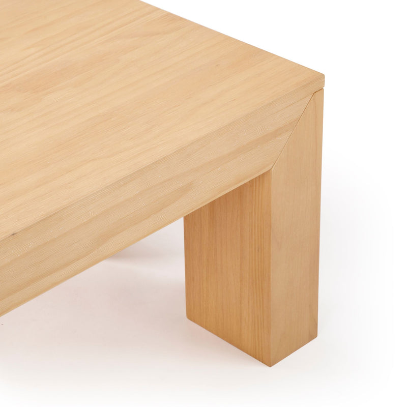 Elegant wooden table leg with natural finish showcasing modern craftsmanship.