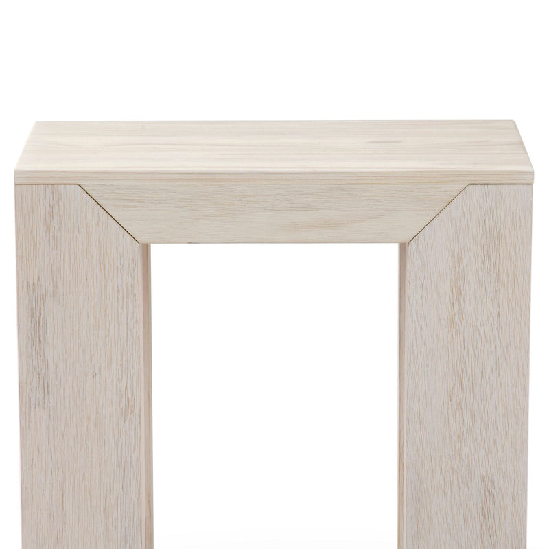 Minimalist light wood fireplace mantel design with clean lines and modern aesthetic.