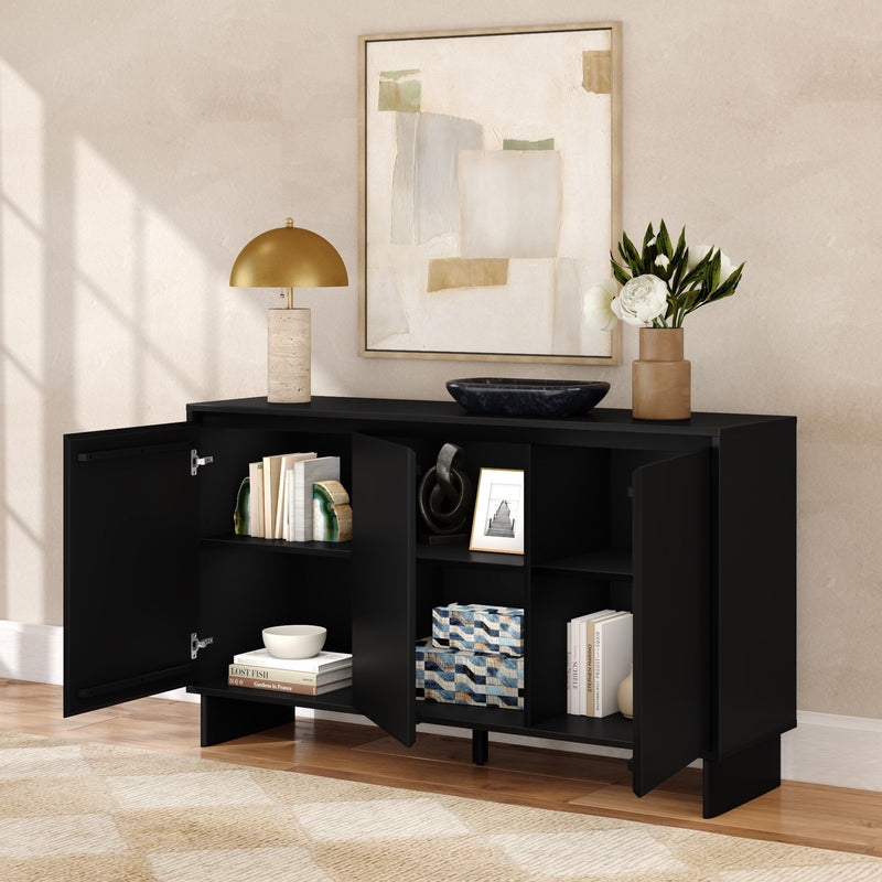 Matte black modern console cabinet with open shelves and doors in living room, gold lamp, abstract wall art, vases and books.