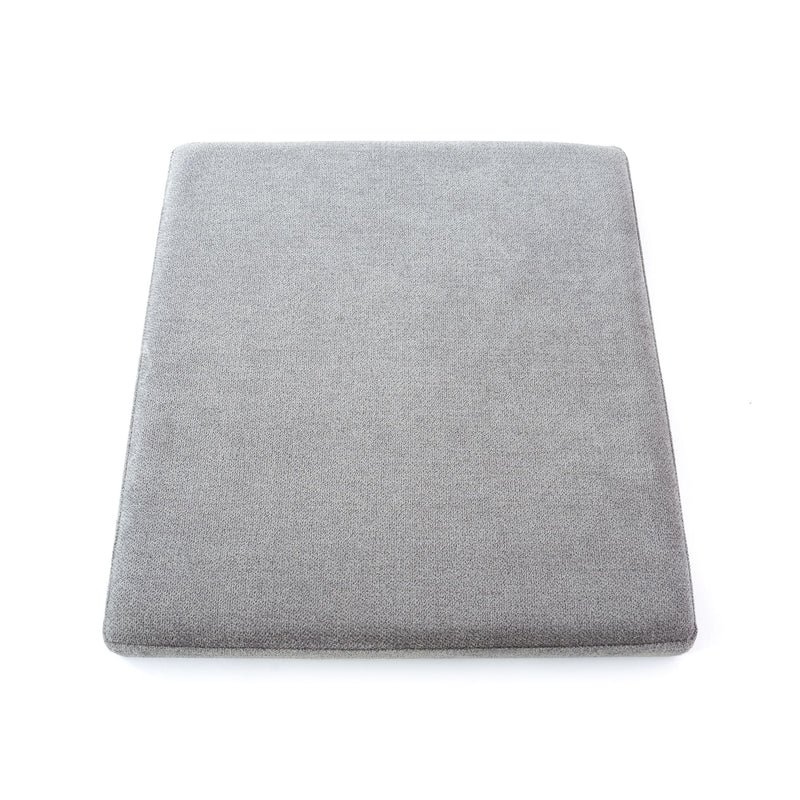 Gray foam folding mattress topper on a white background.