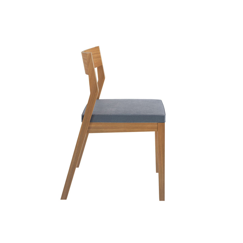 Side view of a modern wooden dining chair with a blue cushioned seat.