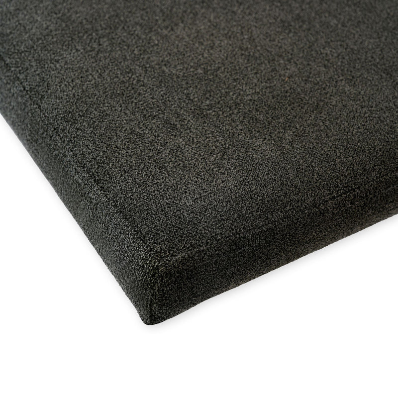 Close-up of a black acoustic panel corner for soundproofing and noise reduction.