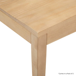 Close-up view of a light wood table corner with smooth edges, showcasing its natural finish and sturdy construction.