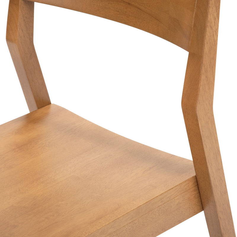 Wooden chair with a curved backrest and minimalist design.