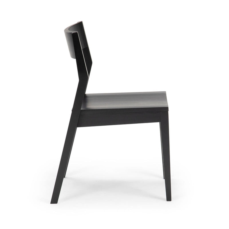 Black modern wooden chair with sleek design and angled backrest, viewed from the side.