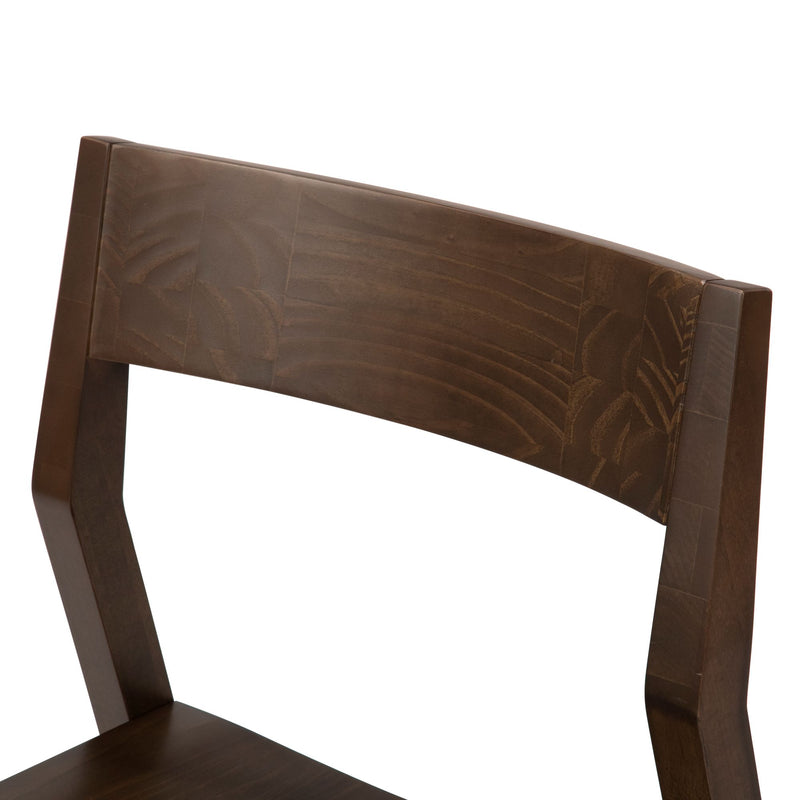 Wooden chair backrest with rich brown finish and elegant design.