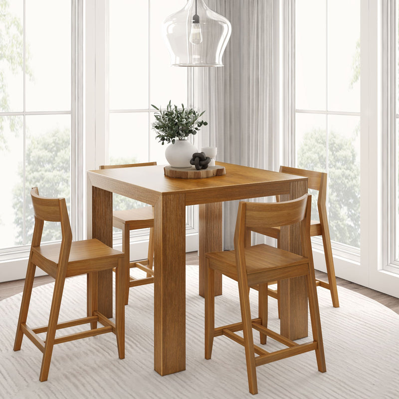 Contemporary wooden dining table set with four chairs in bright dining room.