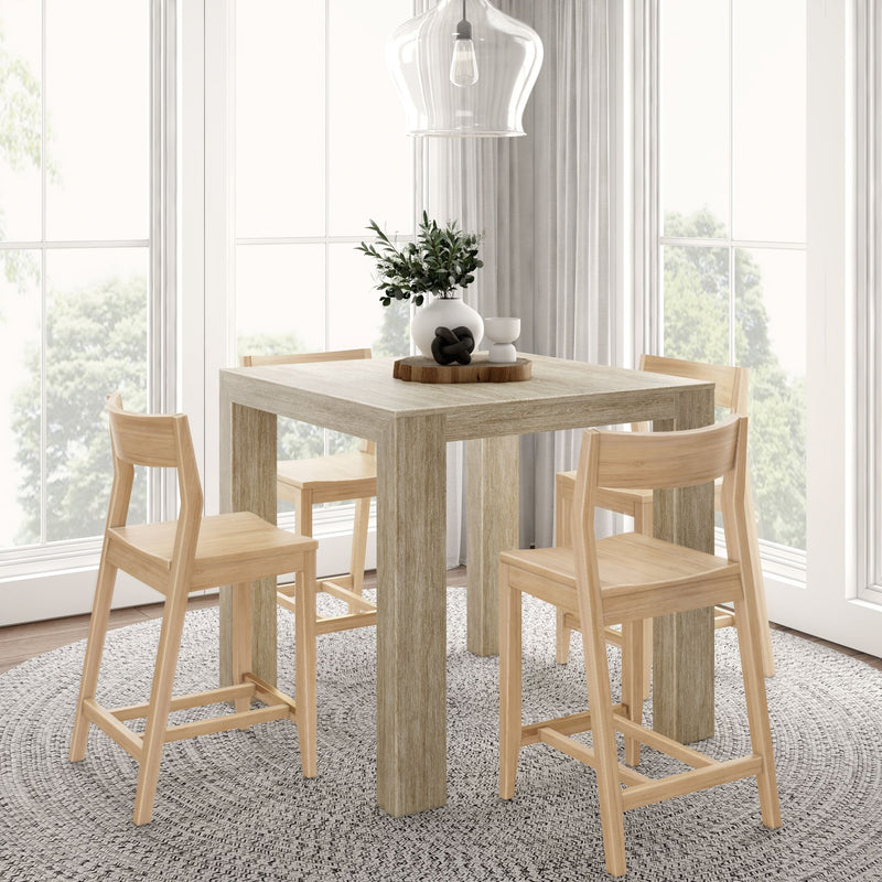 Modern dining room with wooden table and chairs, featuring a stylish pendant light and natural decor.