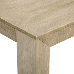 Modern wooden table edge with textured finish.