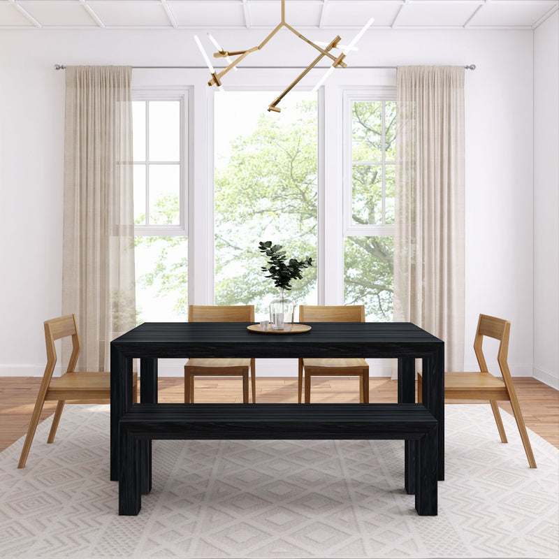 Modern dining room with minimalist black table, wooden chairs, and elegant chandelier.
