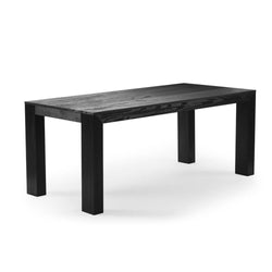 Black wooden rectangular dining table with thick square legs and visible wood grain — modern minimalist kitchen or dining room table