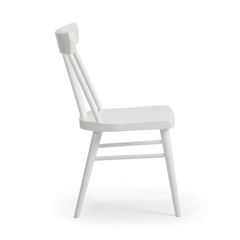 White modern wooden dining chair with spindle back design, side view.