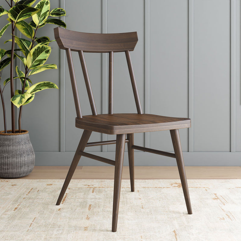 Mid-century modern wooden dining chair with a gray background, perfect for contemporary home decor.