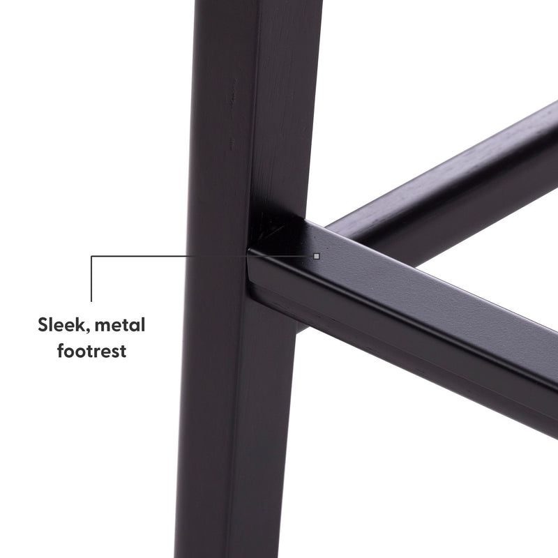 Sleek metal footrest on modern black furniture frame