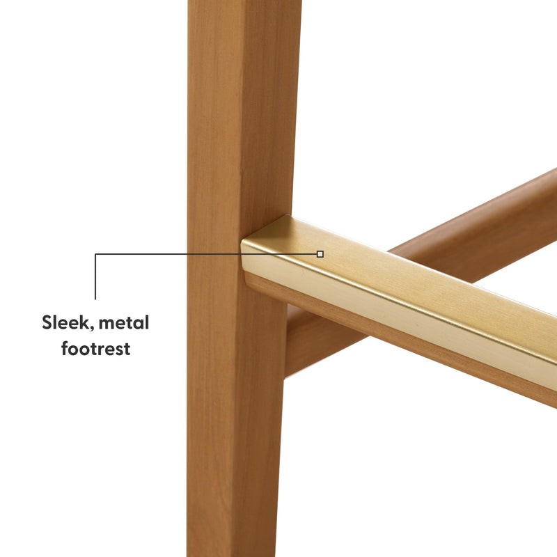 Close-up view of a sleek, modern wooden chair with a gold metal footrest.