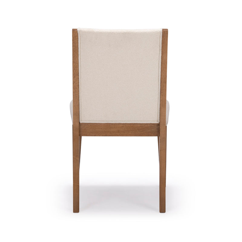 Back view of a modern wooden dining chair with beige upholstery.