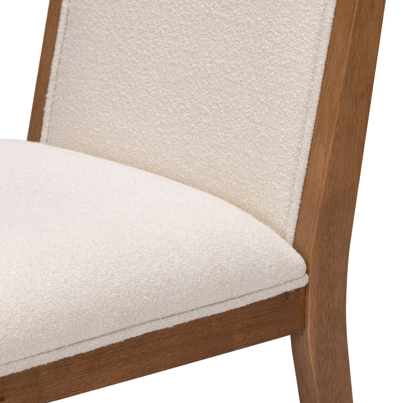 Modern beige cushioned chair with wooden frame detailing.