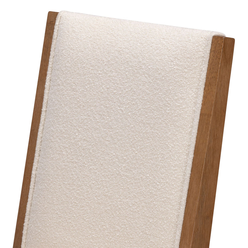 White textured fabric chair back with wooden frame detail.