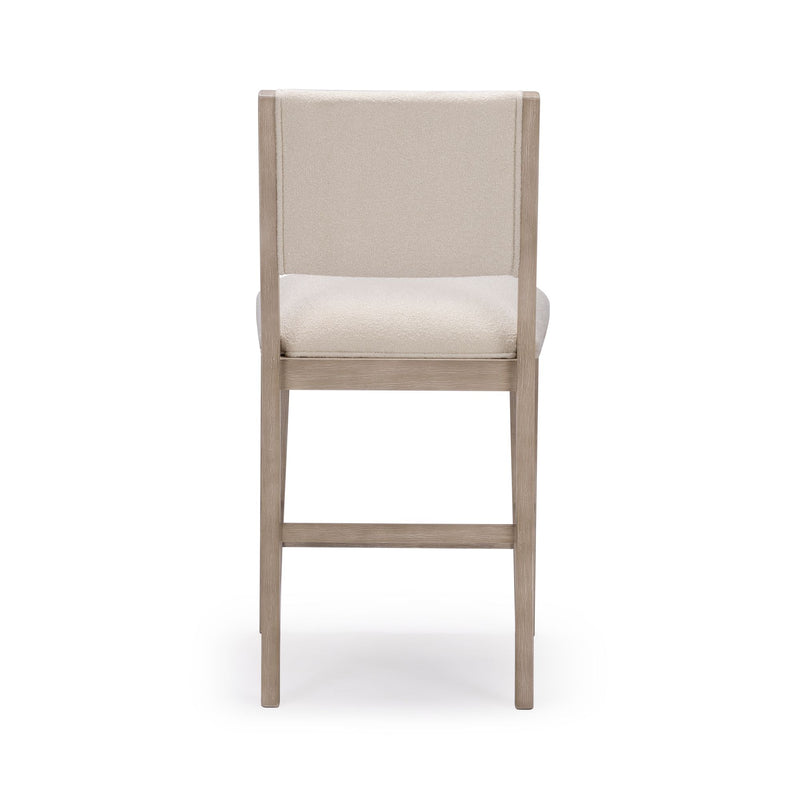 Tall wooden bar stool with beige cushioned backrest and seat ideal for kitchen counter seating.