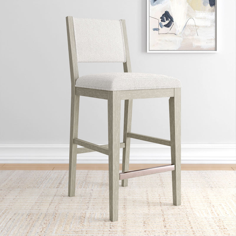 Modern gray wood bar stool with cushioned seat and backrest in a minimalist living space.