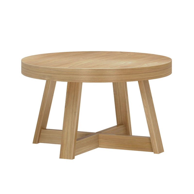 Round wooden coffee table with modern design and sturdy legs.