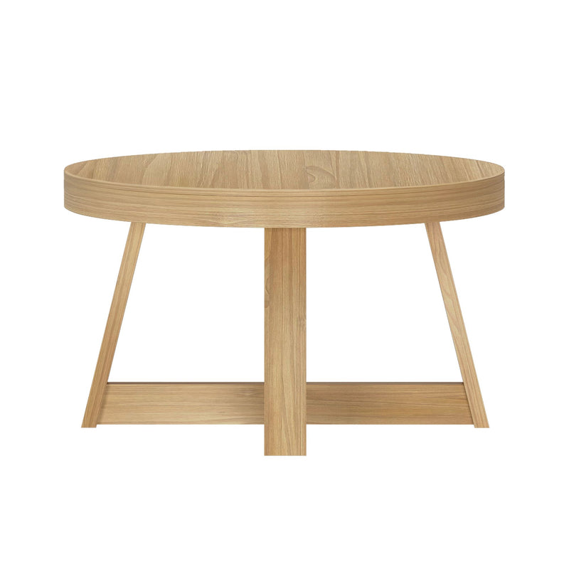 Round wooden coffee table with minimalist design and sturdy legs.
