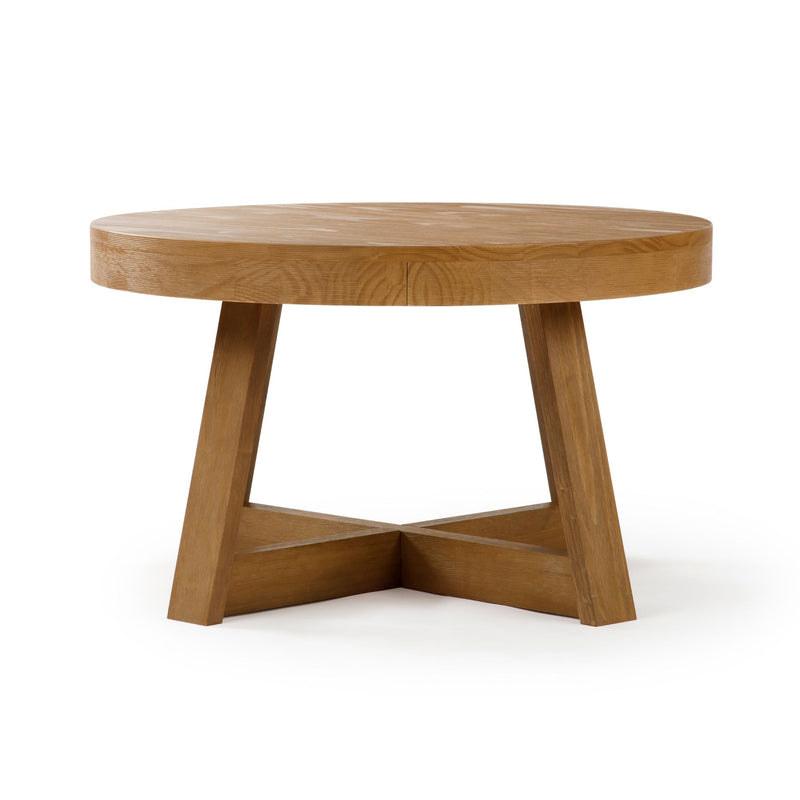 Round wooden coffee table with modern design and sturdy legs.