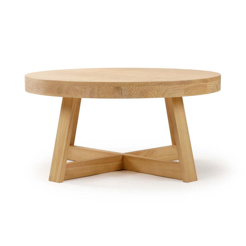 Round wooden coffee table with cross-brace legs, ideal for modern living rooms.