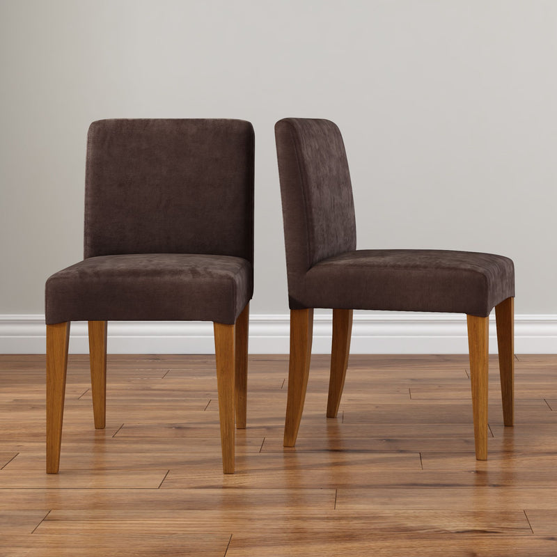 Set of 2 brown upholstered dining chairs with wooden legs on hardwood floor against a neutral wall, modern dining room chairs