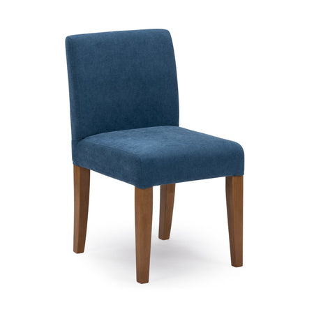 Blue fabric upholstered armless dining chair with tapered brown wooden legs, modern accent chair for kitchen or dining room on white background