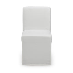 Front view of a modern white slipcovered armless dining chair with tailored skirt and clean lines on a white background