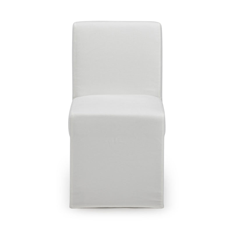 Front view of a modern white slipcovered armless dining chair with tailored skirt and clean lines on a white background