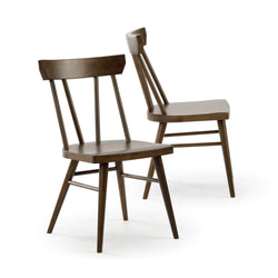 Pair of mid-century modern brown solid wood dining chairs with spindle backs and tapered legs
