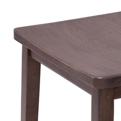 Close-up of a dark wooden table corner, showcasing smooth finish and sturdy construction.