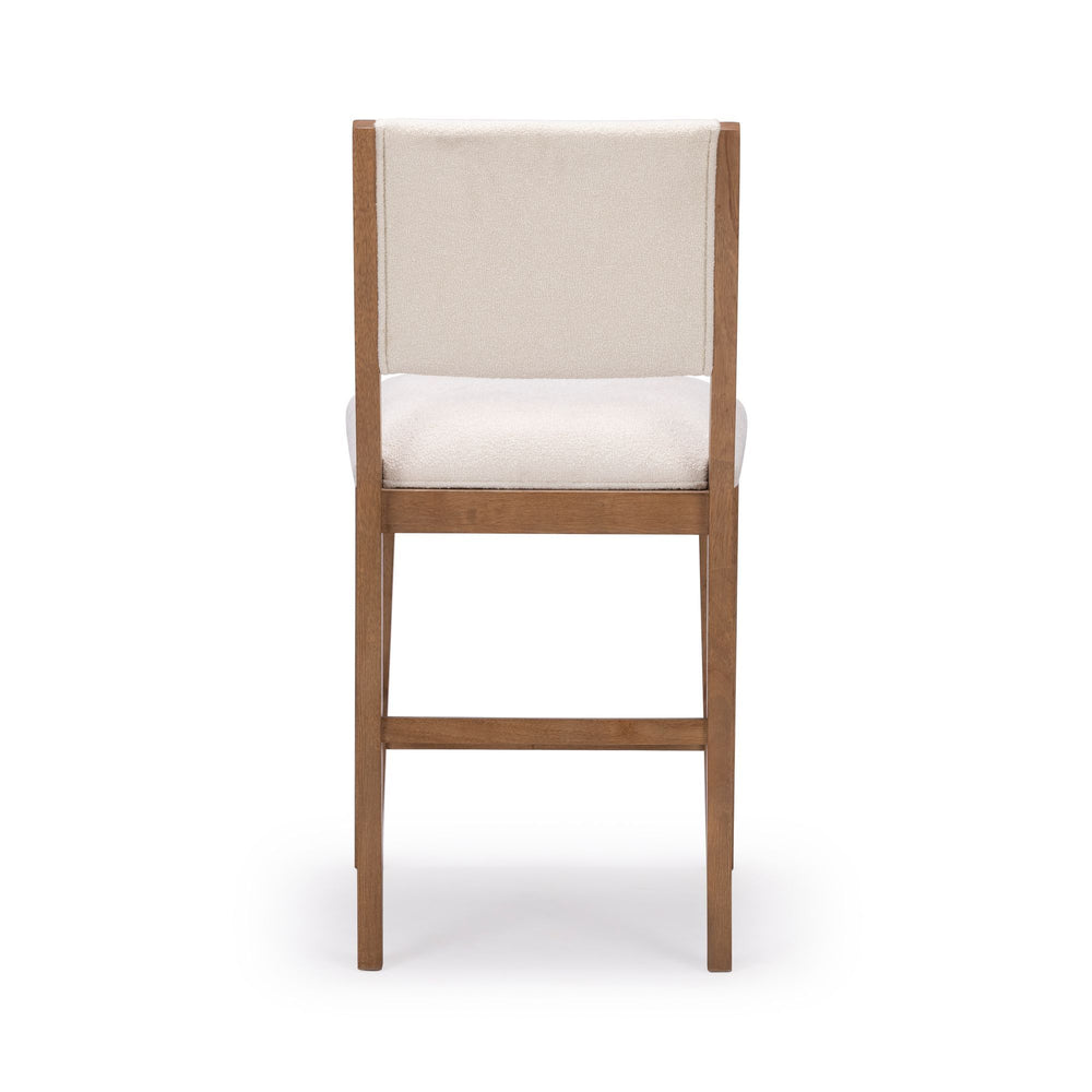 White cushioned wooden bar stool with a modern design and high backrest.