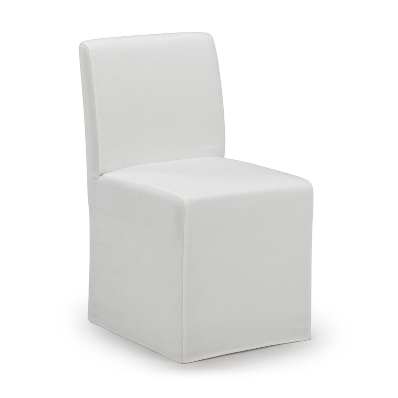 White slipcovered armless dining chair with padded back and seat, tailored floor-length skirt, modern minimalist design on white background