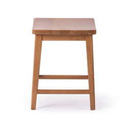 Backless natural wood stool with square seat, tapered legs and footrest — mid-century modern kitchen counter or bar stool