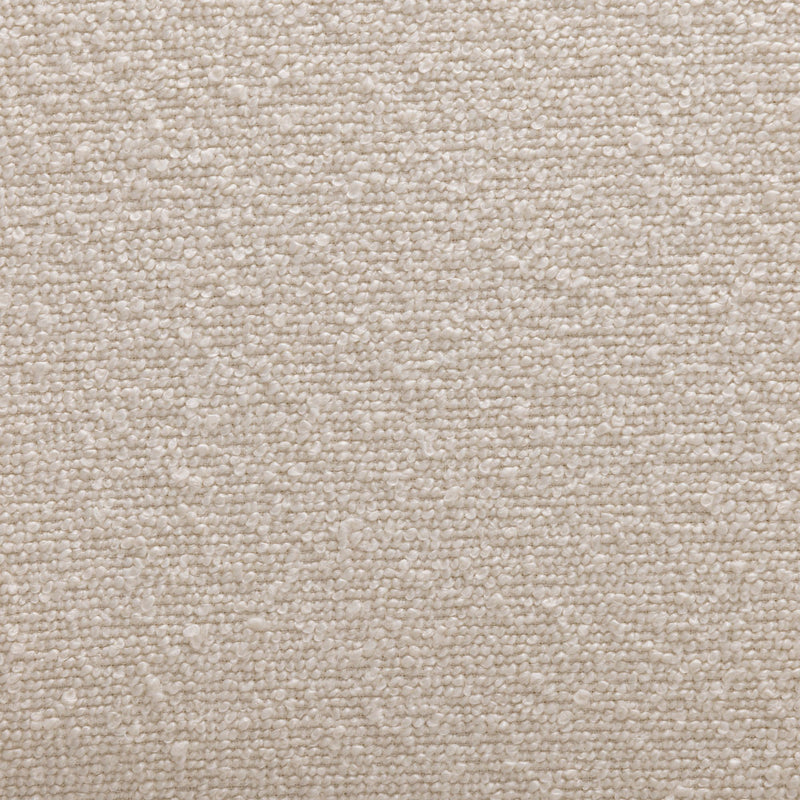 Cream-colored textured fabric surface close-up.