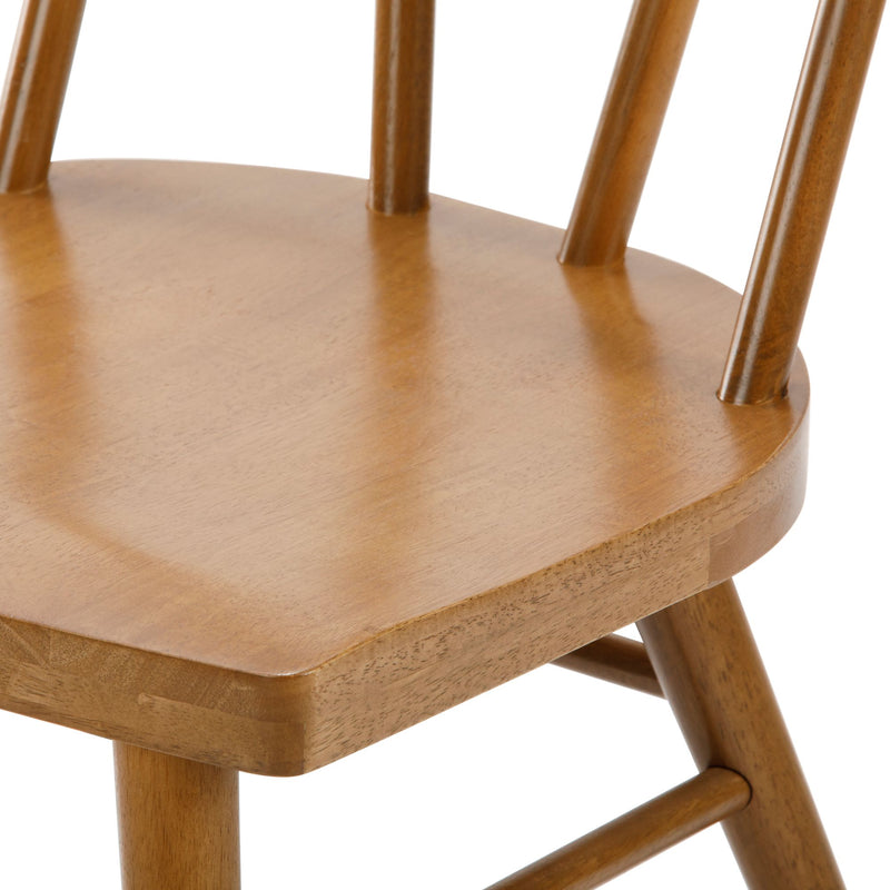 Wooden chair with spindle back design and rustic brown finish.