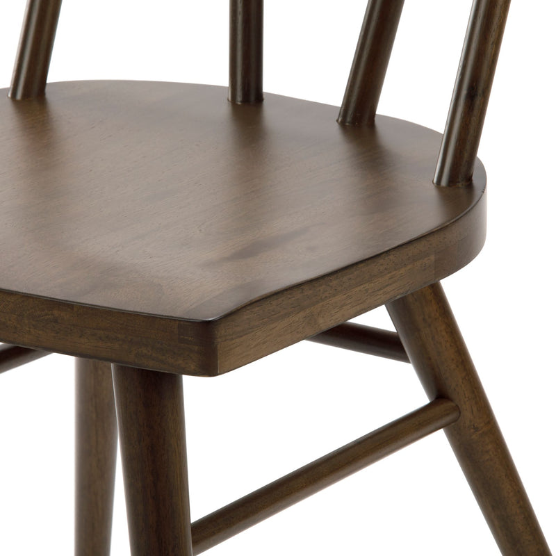 Rustic wooden chair seat with spindle back and sturdy legs.