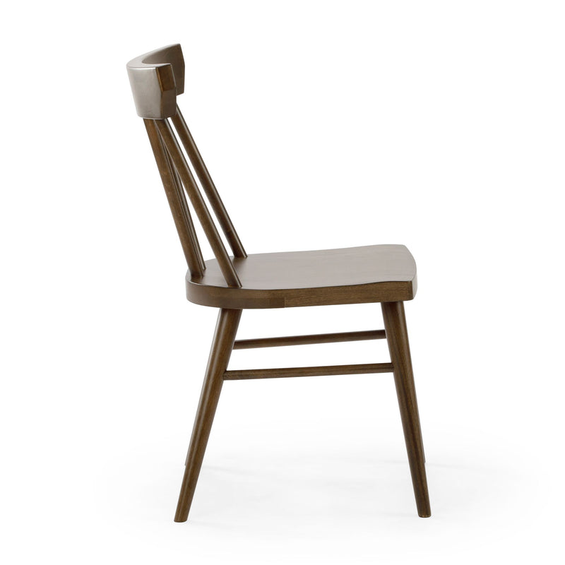 「Modern wooden dining chair with classic spindle back design, side view.」