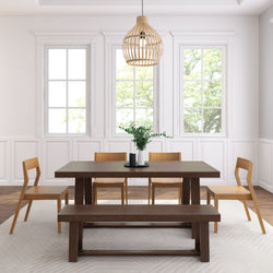 Modern dining room with wooden table, chairs, and pendant light, featuring large windows and bright natural lighting.