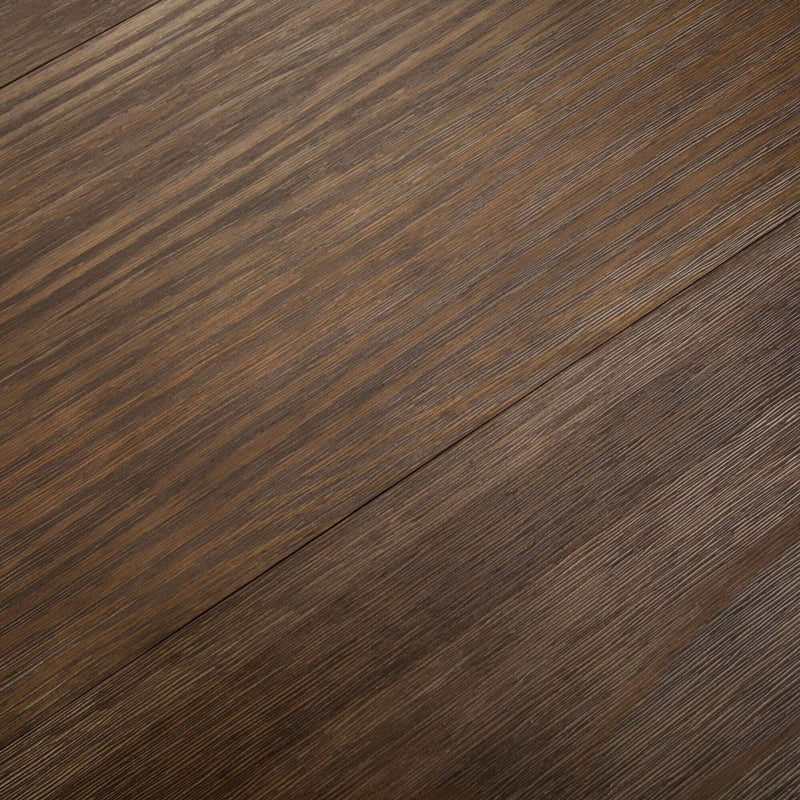 Dark brown wood texture background with diagonal grain and plank seam, rustic oak laminate flooring close-up