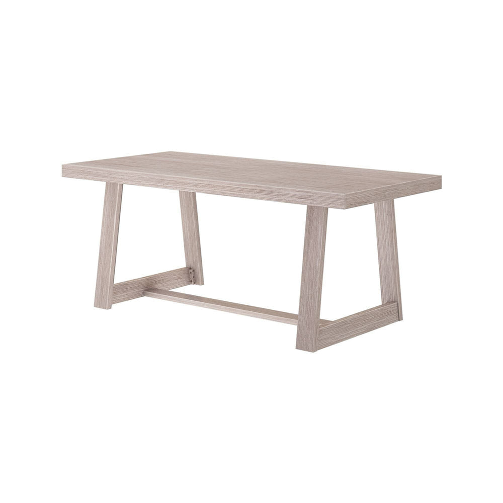 Contemporary wooden dining table with a minimalist design in light oak finish.