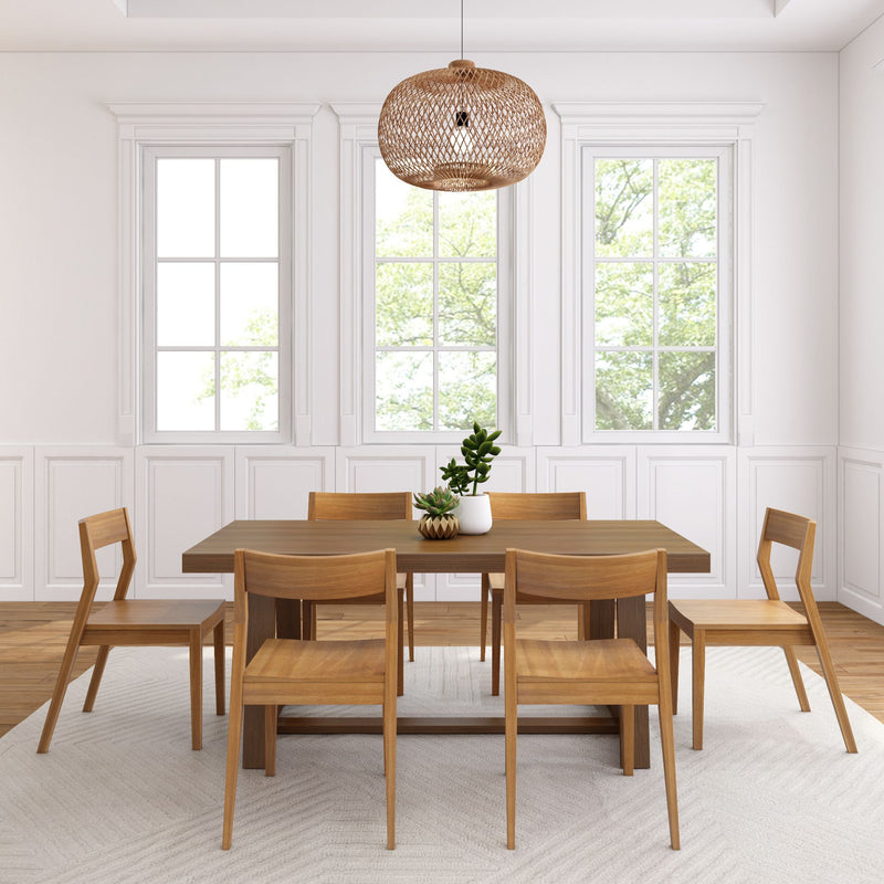 Elegant dining room with wooden table, modern chairs, large windows, and hanging woven lamp.